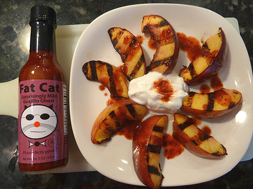 Grilled Peaches with Creme Fraiche and Surprisingly Mild Guajillo Ghost Drizzle