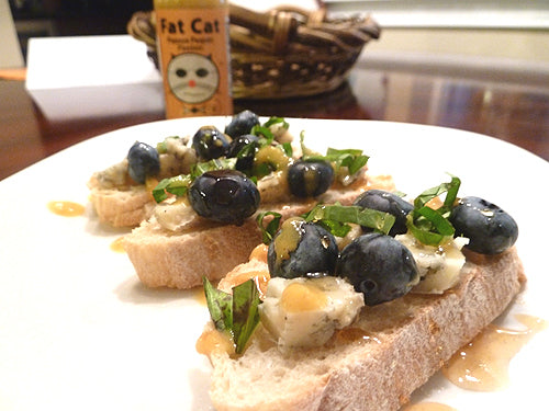 Blueberry, Blue Cheese & Basil Crostini with Honey & Papaya Pequin Passion Hot Sauce