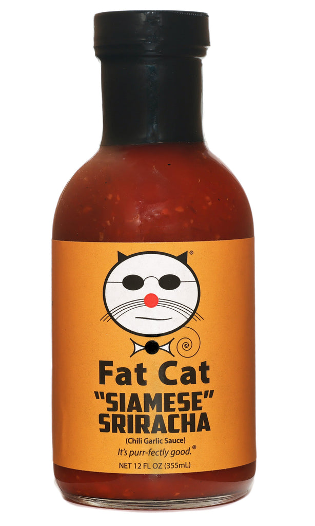 Bottle of Fat Cat Siamese Sriracha sauce on a white background